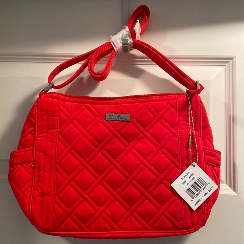On the go should bag in color canyon sunset. New, with tags! Nonsmoking home.